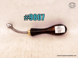 9807 – small unmarked adjustable creaser, $70.00