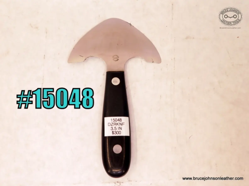 15048 – Bob Dozier round knife, 3-1/2 inches wide, sharpened – $300.00.