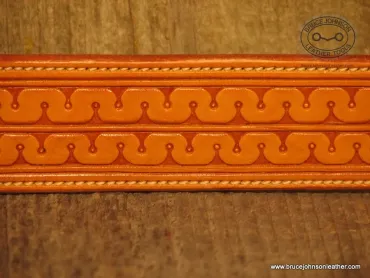 Meander stamped belt