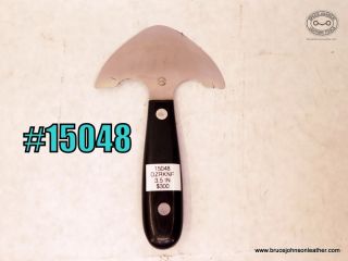 15048 – Bob Dozier round knife, 3-1/2 inches wide – $300.00.